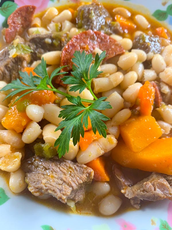 Plato de Guiso de Porotos Plato de Guiso de Porotos